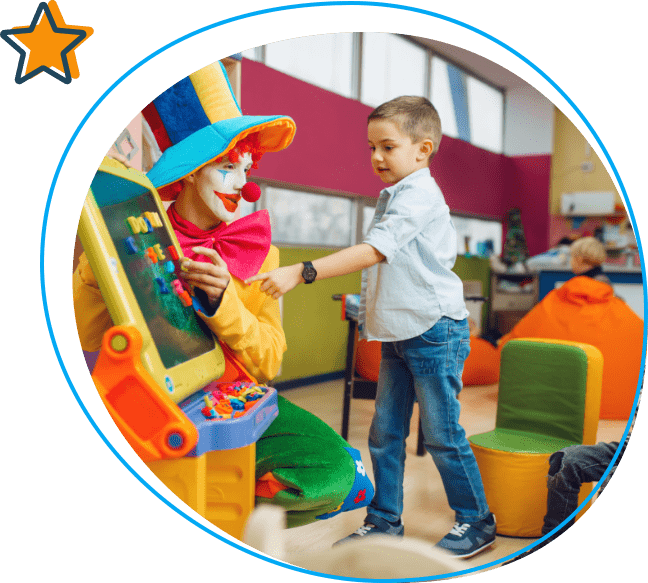 a clown and a kid playing together