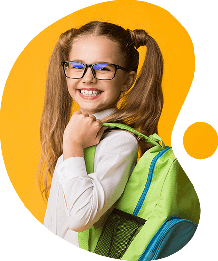 a young girl smiling at the camera